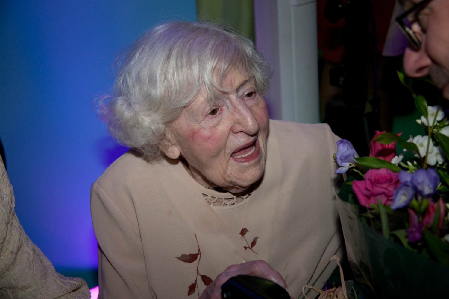 Guild Life member, Marguerite Patten being presented with flowers to celebrate her CBE